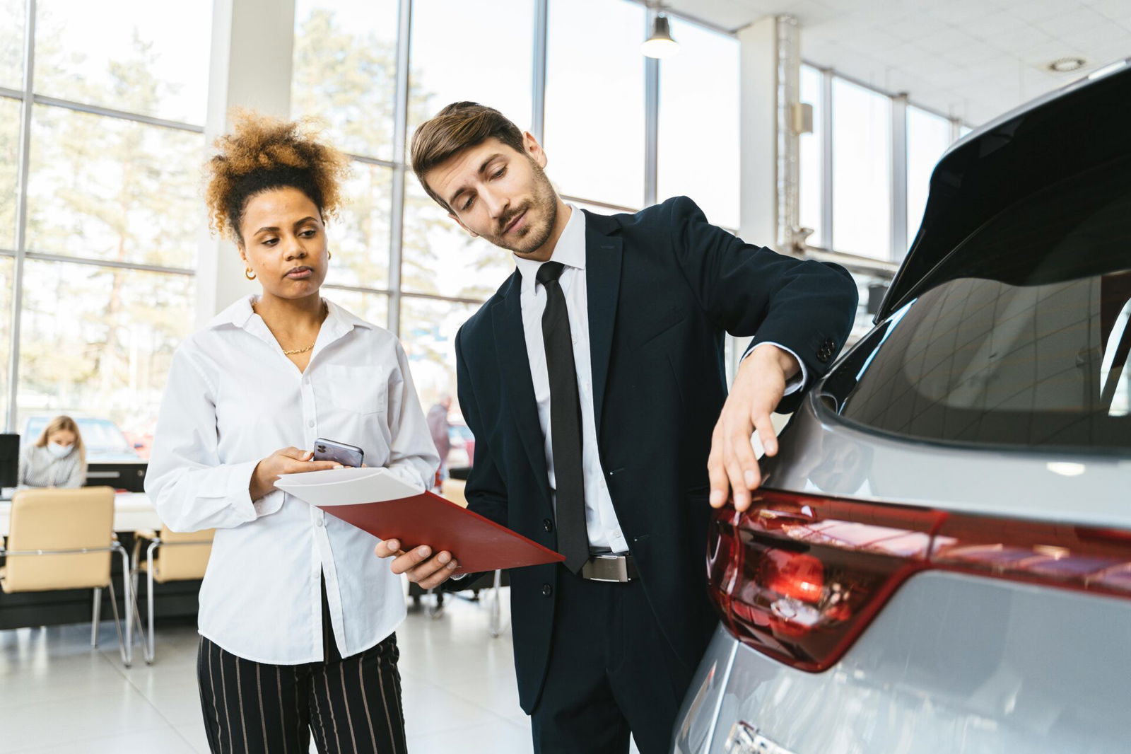 car salesman, dealership, interest, rate